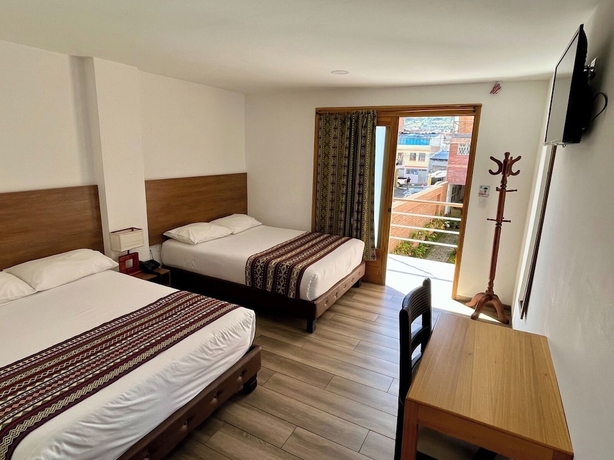 Imagen de la habitación del Hotel Hostal El Geranio. Foto 15