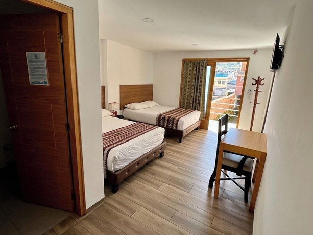 Imagen de la habitación del Hotel Hostal El Geranio. Foto 16