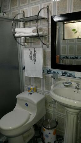 Imagen de la habitación del Hotel Hostal El Parque, Tababela. Foto 14