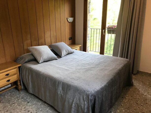 Imagen de la habitación del Hotel Hostal El Quintà. Foto 17