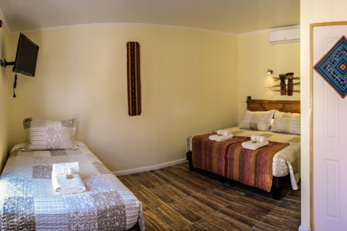 Imagen de la habitación del Hotel Hostal Estacion Del Fuego. Foto 6