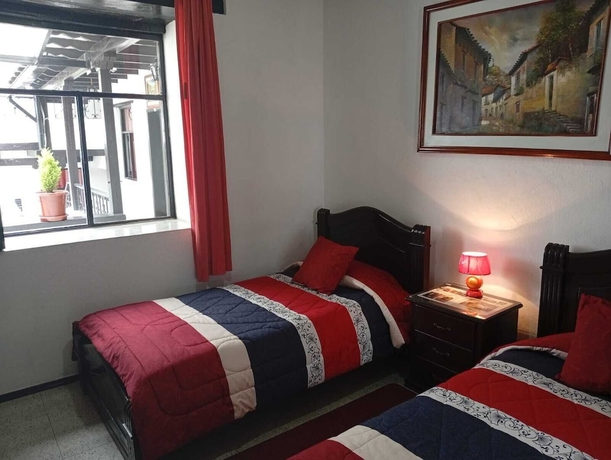 Imagen de la habitación del Hotel Hostal Flores. Foto 7