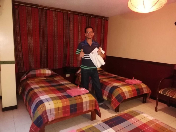 Imagen de la habitación del Hotel Hostal Flying Donkey. Foto 8