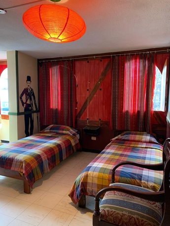 Imagen de la habitación del Hotel Hostal Flying Donkey. Foto 11