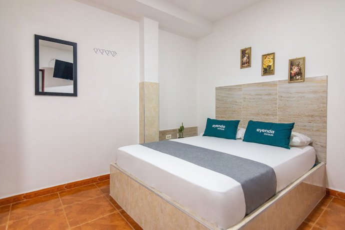 Imagen de la habitación del Hotel Hostal Kumbaya. Foto 12