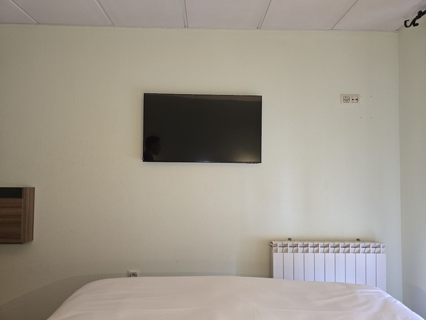 Imagen de la habitación del Hotel Hostal La Cig&uuml;e&ntilde;a, El Espinar. Foto 7