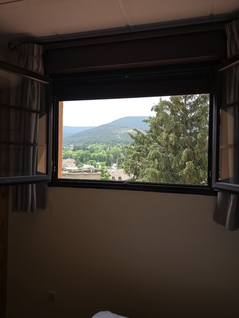 Imagen de la habitación del Hotel Hostal La Cig&uuml;e&ntilde;a, El Espinar. Foto 15