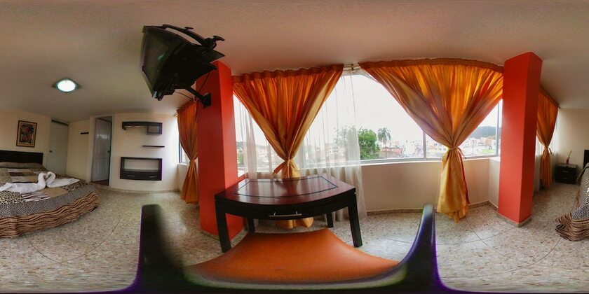 Imagen de la habitación del Hotel Hostal La Rosa Otavalo. Foto 12