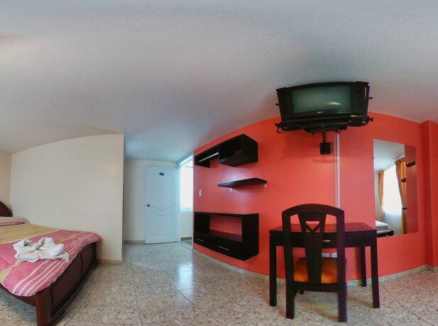 Imagen de la habitación del Hotel Hostal La Rosa Otavalo. Foto 16