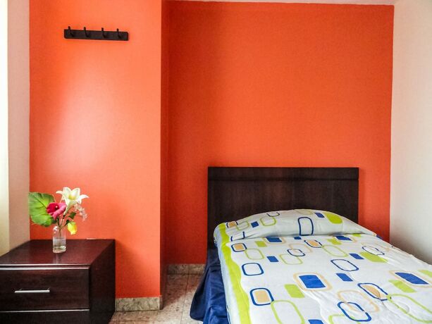 Imagen de la habitación del Hotel Hostal La Rosa Otavalo. Foto 18