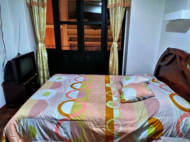 Imagen de la habitación del Hotel Hostal Latitud Ecuem. Foto 3