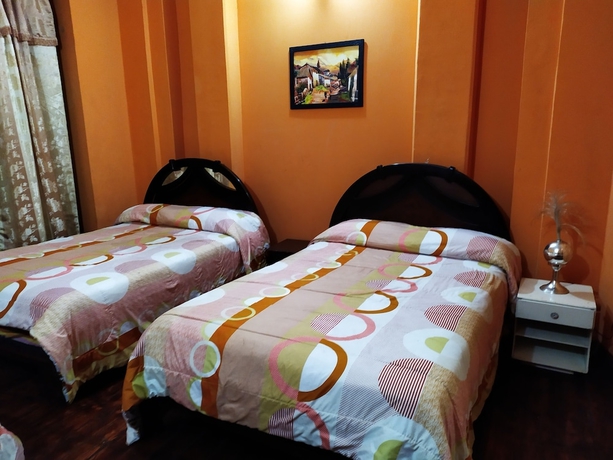 Imagen de la habitación del Hotel Hostal Latitud Ecuem. Foto 5