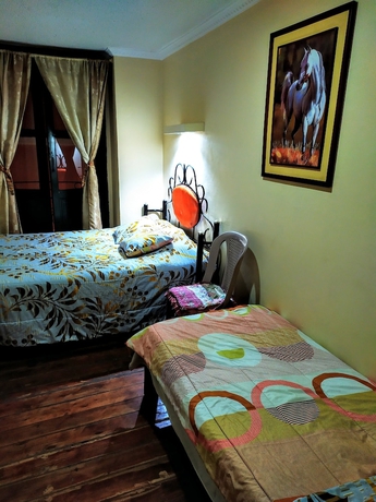 Imagen de la habitación del Hotel Hostal Latitud Ecuem. Foto 11