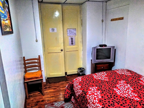 Imagen de la habitación del Hotel Hostal Latitud Ecuem. Foto 12