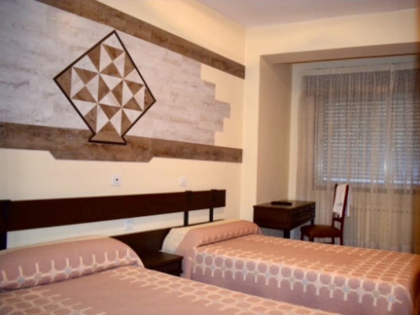 Imagen de la habitación del Hotel Hostal Louro. Foto 7