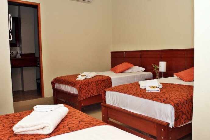 Imagen de la habitación del Hotel Hostal Macambo. Foto 20