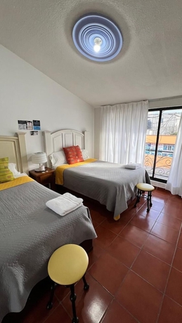 Imagen de la habitación del Hotel Hostal Mago. Foto 7