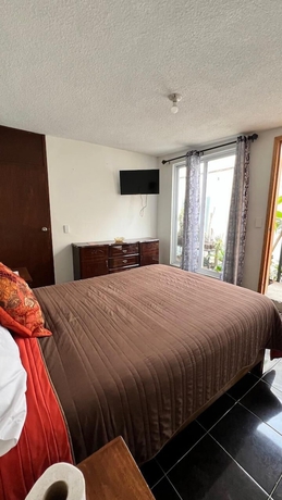 Imagen de la habitación del Hotel Hostal Mago. Foto 13