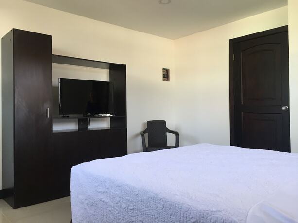Imagen de la habitación del Hotel Hostal Marlyn Sai. Foto 17