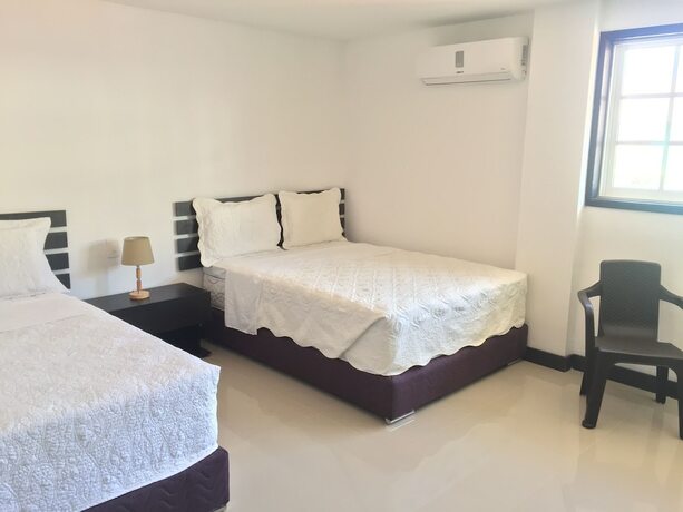 Imagen de la habitación del Hotel Hostal Marlyn Sai. Foto 19