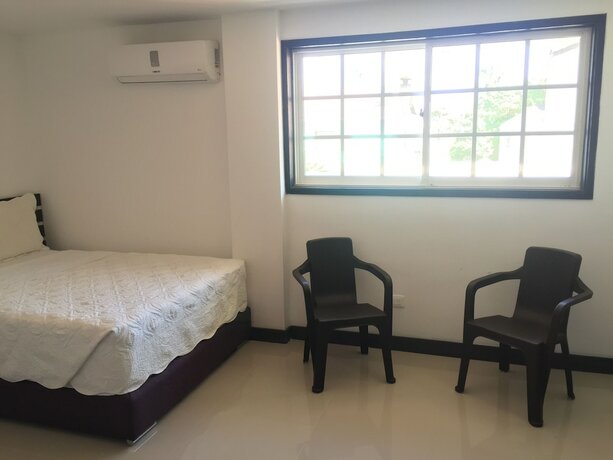 Imagen de la habitación del Hotel Hostal Marlyn Sai. Foto 20