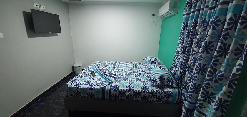 Imagen de la habitación del Hotel Hostal Mi Lindo Septiembre. Foto 11