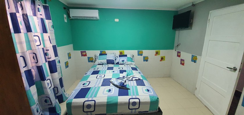 Imagen de la habitación del Hotel Hostal Mi Lindo Septiembre. Foto 18