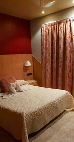 Imagen de la habitación del Hotel Hostal Milenium. Foto 7