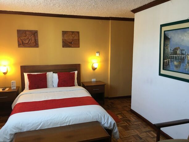 Imagen de la habitación del Hotel Hostal Mitad del Mundo. Foto 15