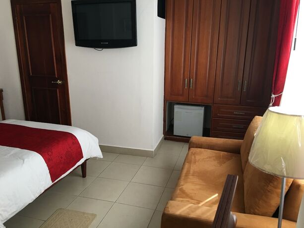 Imagen de la habitación del Hotel Hostal Mitad del Mundo. Foto 17