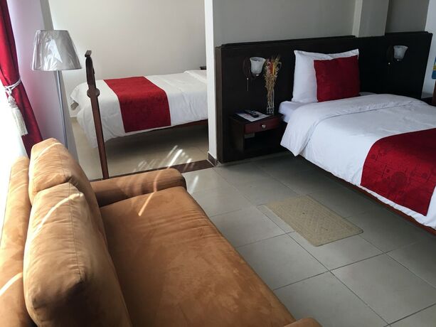 Imagen de la habitación del Hotel Hostal Mitad del Mundo. Foto 18