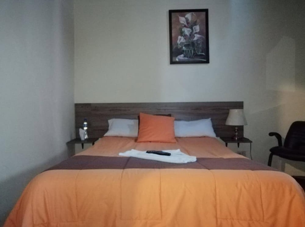 Imagen de la habitación del Hotel Hostal Novel. Foto 14