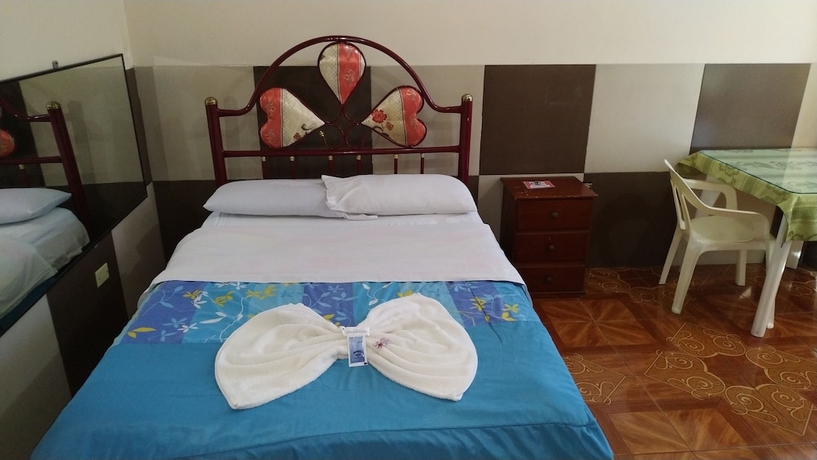 Imagen de la habitación del Hotel Hostal Nuevo Amanecer. Foto 7