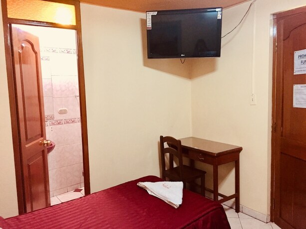 Imagen de la habitación del Hotel Hostal Oasis. Foto 20