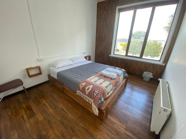 Imagen de la habitación del Hotel Hostal Ochen Punta Arenas. Foto 12