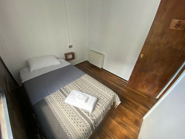 Imagen de la habitación del Hotel Hostal Ochen Punta Arenas. Foto 15