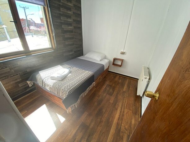 Imagen de la habitación del Hotel Hostal Ochen Punta Arenas. Foto 18