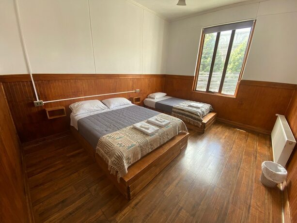 Imagen de la habitación del Hotel Hostal Ochen Punta Arenas. Foto 19