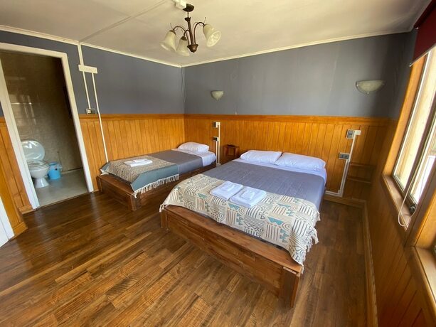 Imagen de la habitación del Hotel Hostal Ochen Punta Arenas. Foto 20