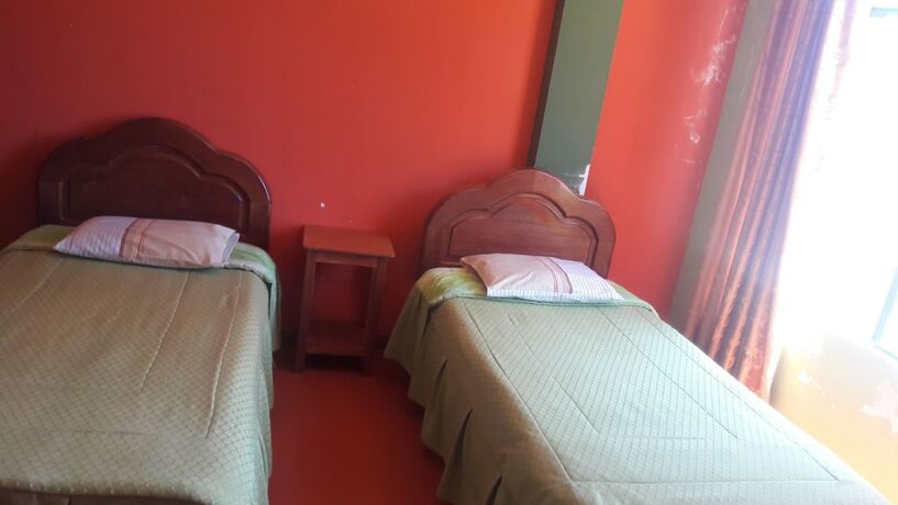 Imagen de la habitación del Hotel Hostal Olas del Titicaca - Hostel. Foto 13