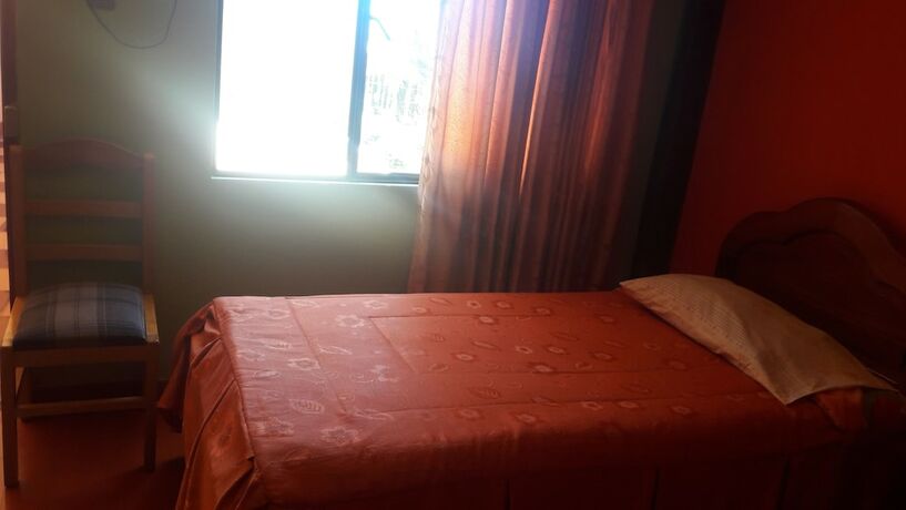 Imagen de la habitación del Hotel Hostal Olas del Titicaca - Hostel. Foto 14