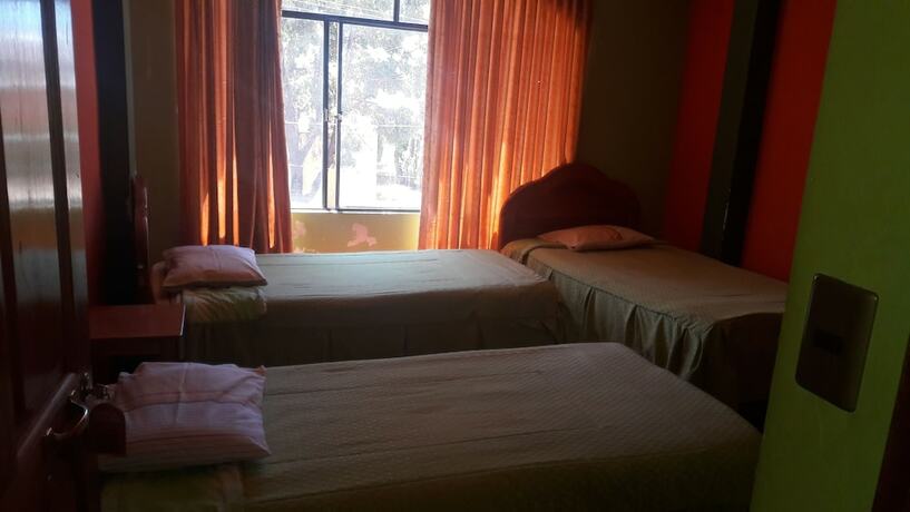 Imagen de la habitación del Hotel Hostal Olas del Titicaca - Hostel. Foto 16