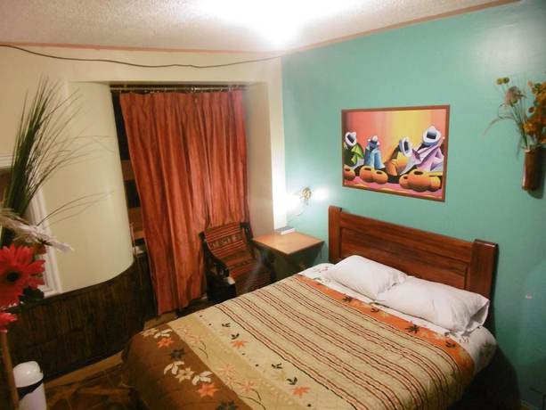 Imagen de la habitación del Hotel Hostal Otavalos Inn-Hostel. Foto 7