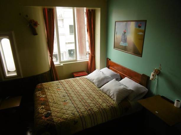 Imagen de la habitación del Hotel Hostal Otavalos Inn-Hostel. Foto 13