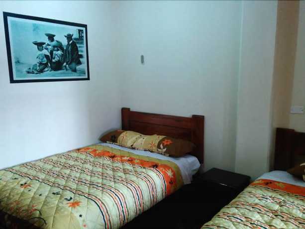 Imagen de la habitación del Hotel Hostal Otavalos Inn-Hostel. Foto 16