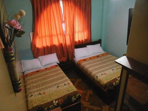 Imagen de la habitación del Hotel Hostal Otavalos Inn-Hostel. Foto 17