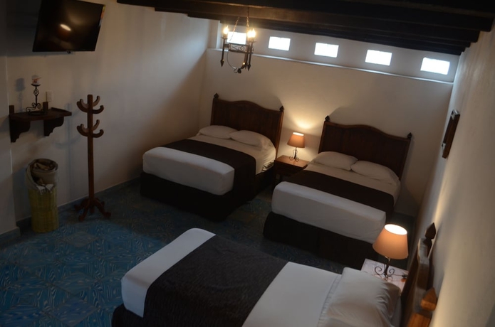 Imagen de la habitación del Hotel Hostal Plaza Central. Foto 14