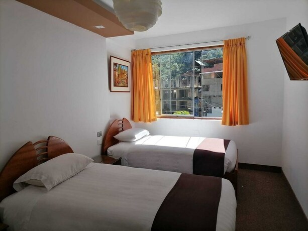 Imagen de la habitación del Hotel Hostal Premier Inn. Foto 20