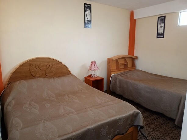 Imagen de la habitación del Hotel Hostal Puerto Alegre. Foto 14