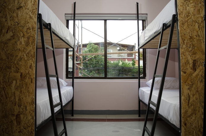 Imagen de la habitación del Hotel Hostal Pura Vida La 70. Foto 11